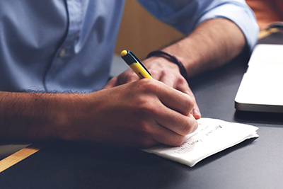 Man taking notes